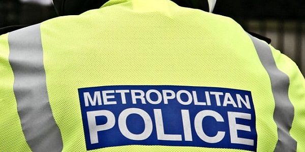 Two teens guilty of arson at Gants Hill 635_met police jacket back.jpg